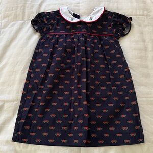 The Beaufort Bonnet and Company 
Navy Dress with Floral Pattern and White Collar